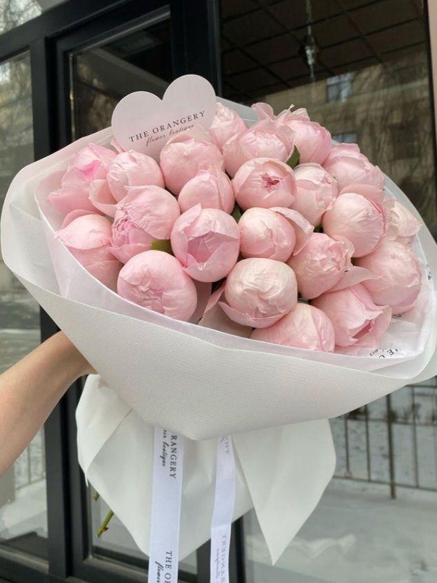 Professional floral arrangement in modern corporate setting